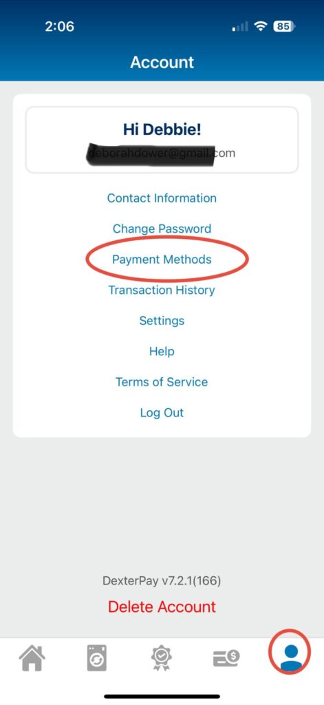 Account screen of the DexterPay app showing user greeting, payment methods section, and navigation options for managing laundry payments at Paradise Laundry.