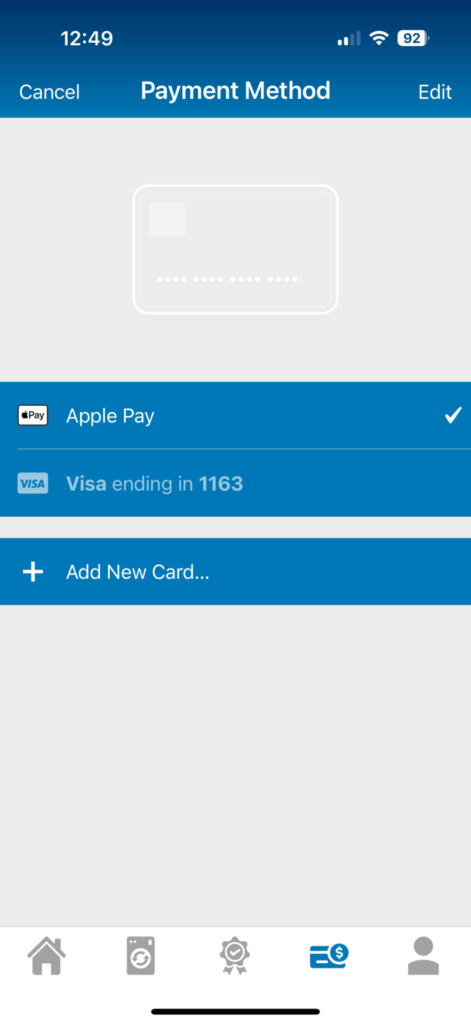 Payment method screen from the DexterPay app displaying options for Apple Pay and a Visa card ending in 1163, relevant for managing payments for laundry services at Paradise Laundry.