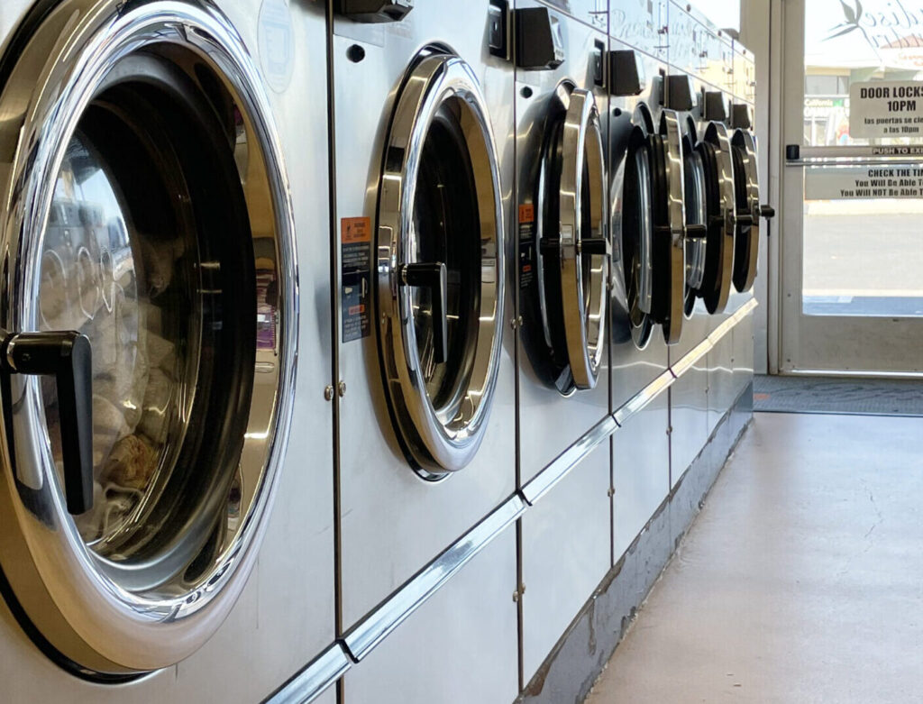 Commercial ozone laundry machines providing sanitized and eco-friendly fabric care at Paradise Laundry